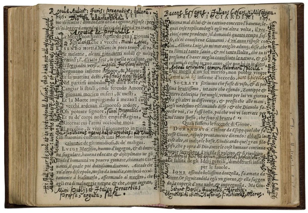Annotated open book page from the 16th century